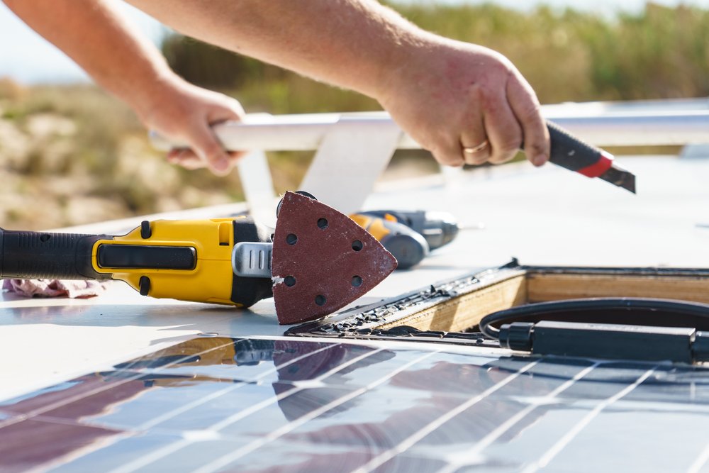a man installing diy solar panels