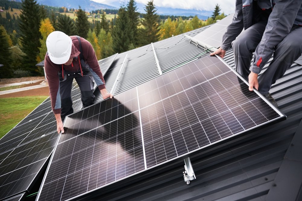 solar installers installing panels