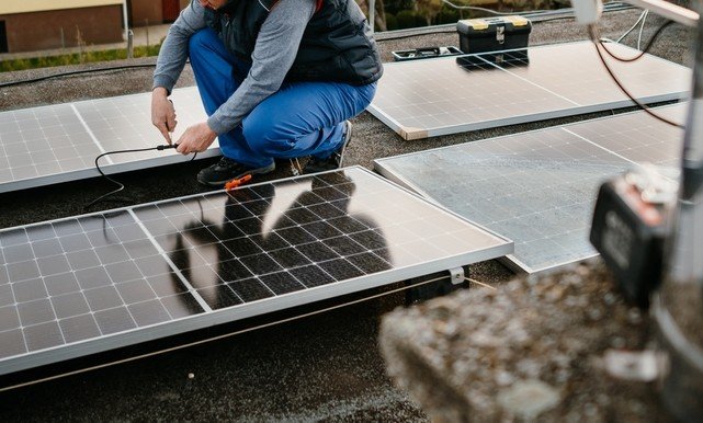 solar professional installing solar panles